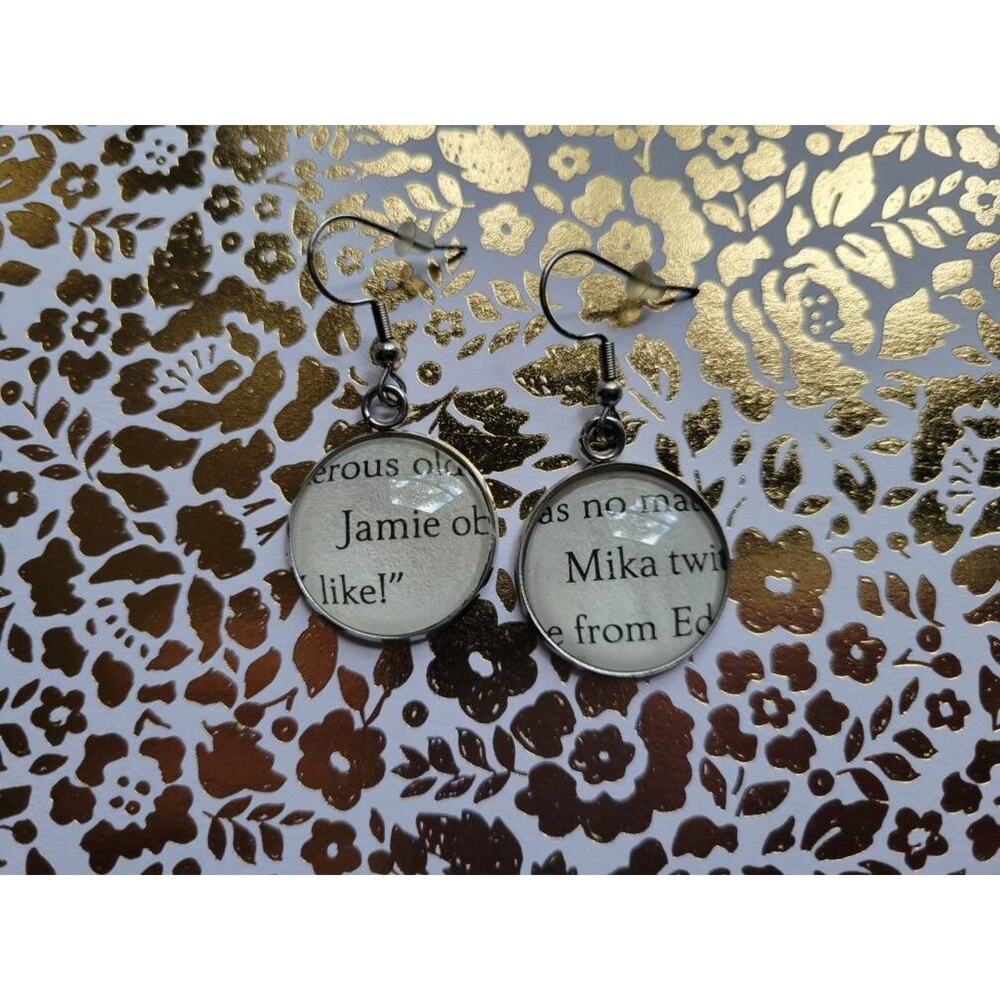 Jamie and Mika earrings made from Very Secret Society of Irregular Witches pages